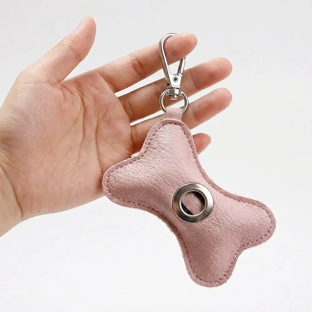 Distributeur de sacs à crottes pour chien en PU cuir portable en forme d'os - Image 6