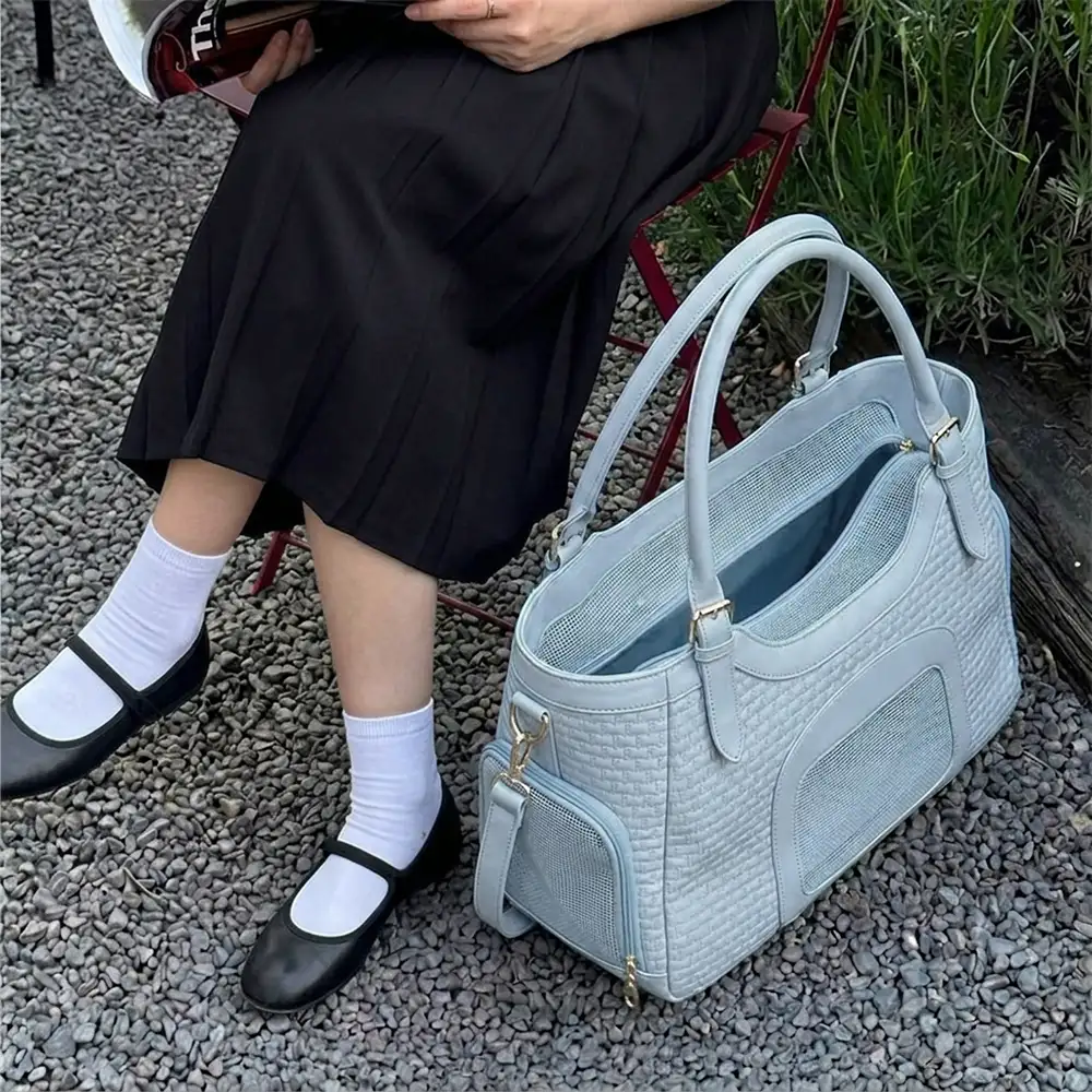 Sac de transport pour animaux en cuir synthétique respirant et portable, adapté pour les chiens et les chats, idéal pour les voyages et les vétérinaires. - Image 7