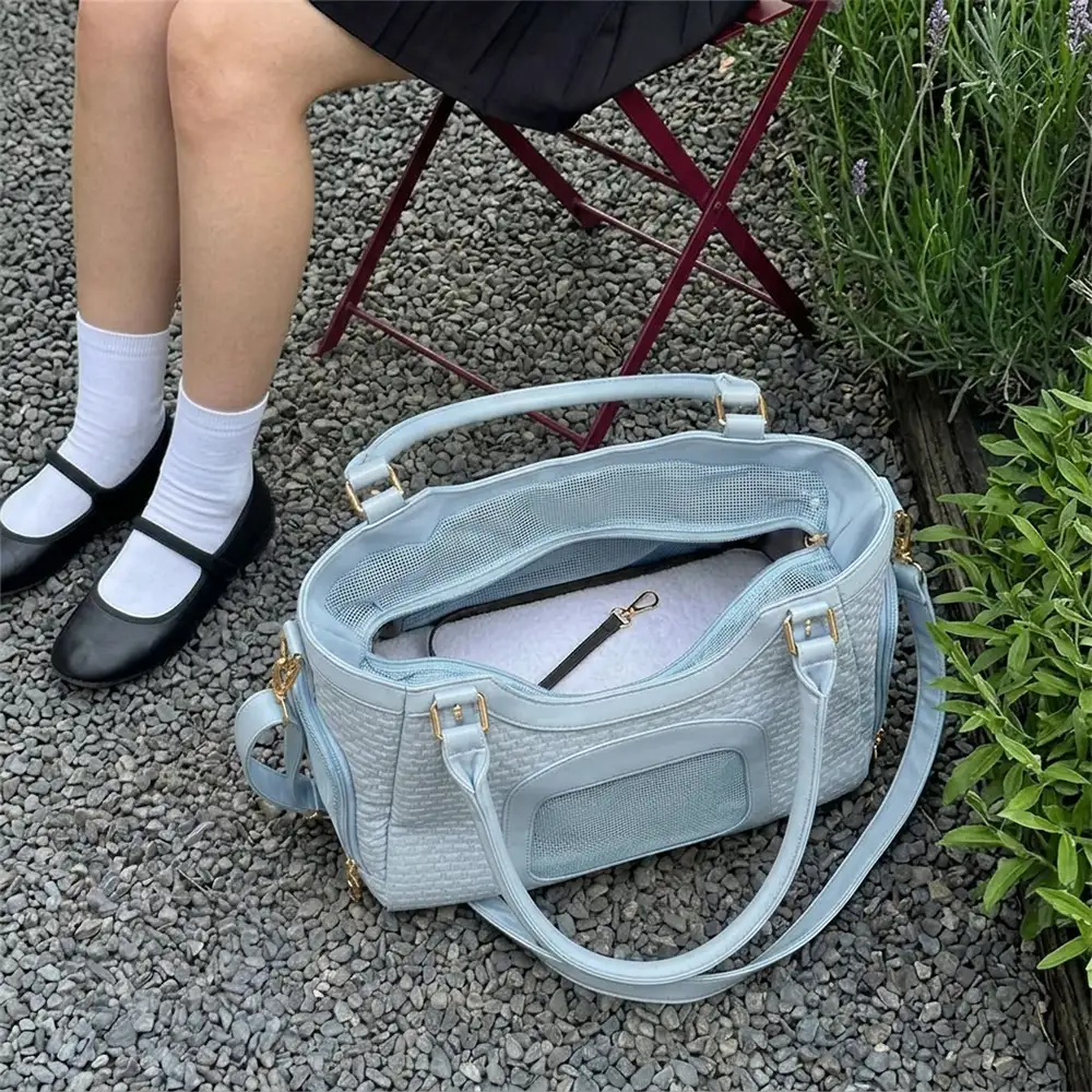 Sac de transport pour animaux en cuir synthétique respirant et portable, adapté pour les chiens et les chats, idéal pour les voyages et les vétérinaires. - Image 8